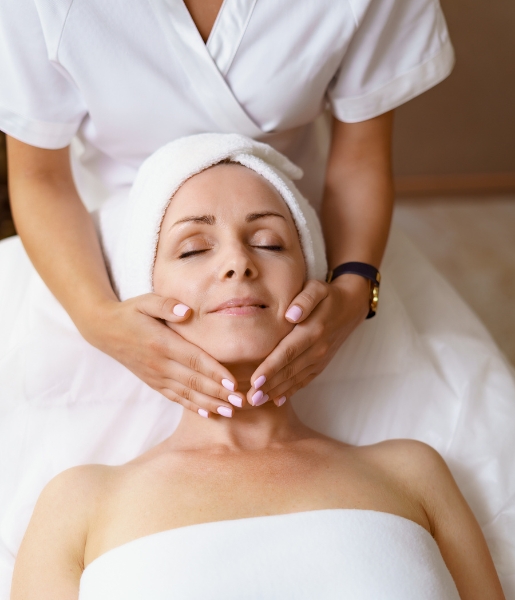 Soothing facial treatment performed in a peaceful skincare studio at The Witty Waxer in Modesto, CA